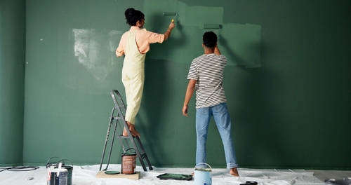 Couple,,People,And,House,Wall,Or,Painting,,Roller,And,Home