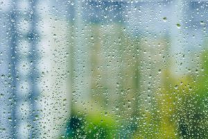 Rainy,Droplets,On,A,Wet,Window,Glass,Transparent,Surface.,Drops